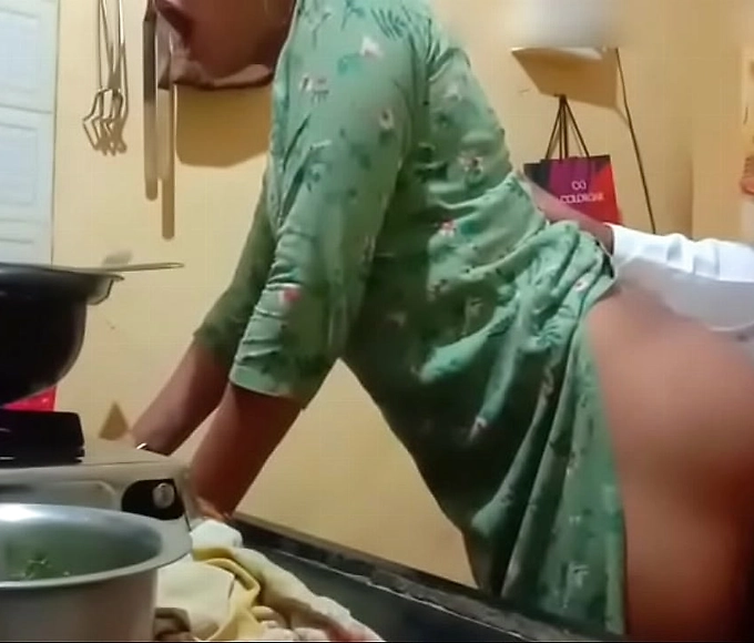 Experience the Thrill of Taboo Sex with a Hot Neighborhood Auntie: She Gets Fucked by a Young Boy in the Kitchen!