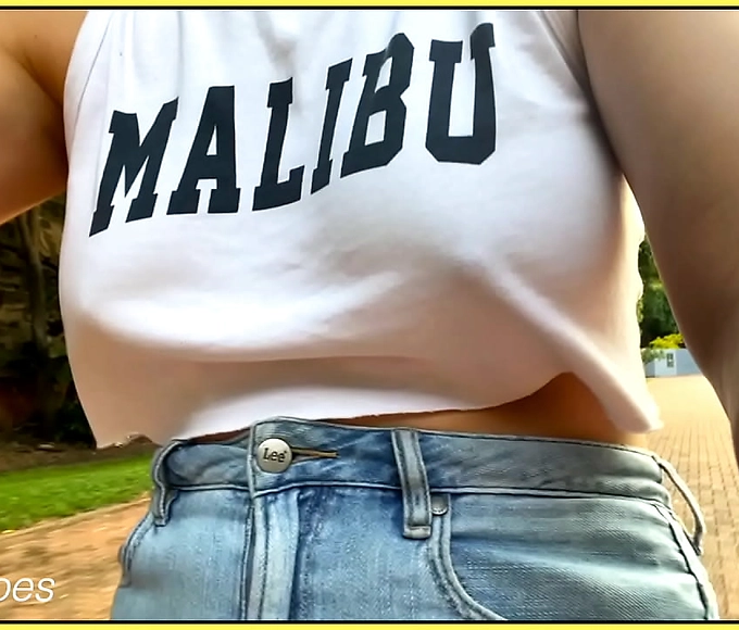 Catch a Glimpse of This Enchantress' Luscious Bosom as She Goes Braless in Public!